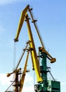 Crane at the scrapyard in the seaport Royalty Free Stock Photo