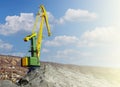 crane at the scrapyard in the seaport Royalty Free Stock Photo