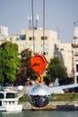 Crane and silver disco ball