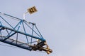 Crane on sky background. Construction works. Royalty Free Stock Photo