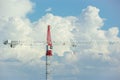 Crane in the sky with cloud background