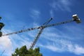 Crane sun built buildings and houses construction industry structure metal Royalty Free Stock Photo