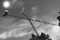 Crane sun built buildings and houses construction industry structure metal Royalty Free Stock Photo