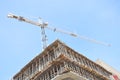 Crane on top of building Royalty Free Stock Photo