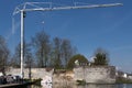 Crane truck trying to help rescuing a collapsed fortified city wall