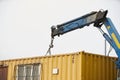 Crane truck unloading portable workers house container booth