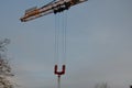 a crane with two ropes in common suspension. metal hook. Royalty Free Stock Photo