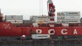 Crane unloaded container cargo ship Sevmorput - Russian nuclear-powered icebreaker lighter aboard ship carrier. Commercial termina