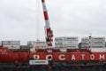 Crane unloaded Russian container cargo ship Sevmorput - nuclear-powered icebreaker lighter aboard ship carrier. Terminal commercia