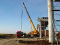 Crane unloads the beam