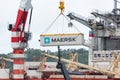 Crane unloads container ship Sevmorput - Russian nuclear-powered icebreaker lighter aboard ship carrier. Container