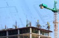 Crane working in construction on blue sky Royalty Free Stock Photo