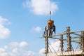 Crane working in construction on blue sky Royalty Free Stock Photo