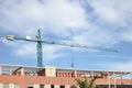 A crane working on the construction of a building Royalty Free Stock Photo