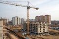 Crane working at construction site for residential building Royalty Free Stock Photo