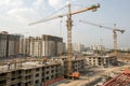 Crane working at construction site for residential building Royalty Free Stock Photo