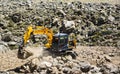 Crane working in a hillside Royalty Free Stock Photo