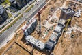 crane working on under construction high-rise residential complex. aerial view