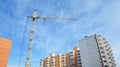 Cranes construction with beautiful clouds sky panorama. Building construction growth and global construction industry and gdp Royalty Free Stock Photo