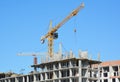 Cranes construction. Building construction growth and global construction industry concept
