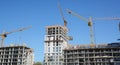 Cranes construction. Building construction growth and global construction industry and gdp growth concept