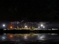 Cranes at construction site, night panorama starry sky Royalty Free Stock Photo