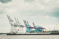 Cranes at the container terminals in the port of Hamburg Royalty Free Stock Photo