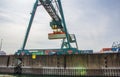 Cranes,containers and cargo around the Rhine river in the industrial port of Cologne North Rhine Westphalia Germany