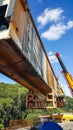 Cranes are lifting the steel main girder Royalty Free Stock Photo