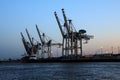 Cranes in the port of Hamburg at dusk