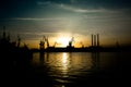 Cranes at Sunset in Harbor of Pula in Croatia Royalty Free Stock Photo