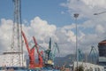 Cranes at the terminal cargo port, cargo cranes without work in an empty port harbor. Defaulted paralyzed the entire economy of