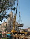 Cranes Working On Underground Mumbai: CSMT, Metro Iii Station At BMC Building Royalty Free Stock Photo