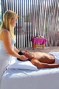 Cranial sacral massage theraphy in Jungle cabin Royalty Free Stock Photo