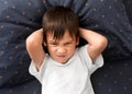 Cranky child boy refuses to go to bed Royalty Free Stock Photo