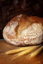 Homemade bread loaf on old cutting board