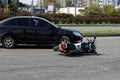 Crash moto bike and car on road Royalty Free Stock Photo