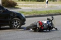 Crash moto bike and car on road Royalty Free Stock Photo