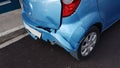 Crashed damaged blue car in the rigth back side Royalty Free Stock Photo