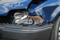 Crashed Headlight on Blue Car Royalty Free Stock Photo