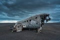 Crashed military DC 3 plane wreck on black sand beach in Iceland Royalty Free Stock Photo