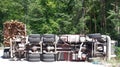 Crashed overturning truck with firewood Royalty Free Stock Photo