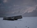 Crashed plane on a snowy field in iceland Royalty Free Stock Photo