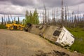 A crashed semi trailer on the cassiar highway