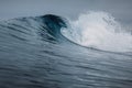 Crashing glassy wave on sandy beach. Perfect swell for surfing Royalty Free Stock Photo