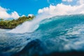 Crashing perfect wave in sea. Breaking barrel wave