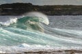 Crashing powerful surf wave at beach Royalty Free Stock Photo