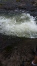 Crashing water against rocks