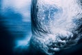 Crashing wave with foam and air bubbles underwater. Transparent sea water Royalty Free Stock Photo