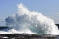 Crashing waves on rock ledge Royalty Free Stock Photo